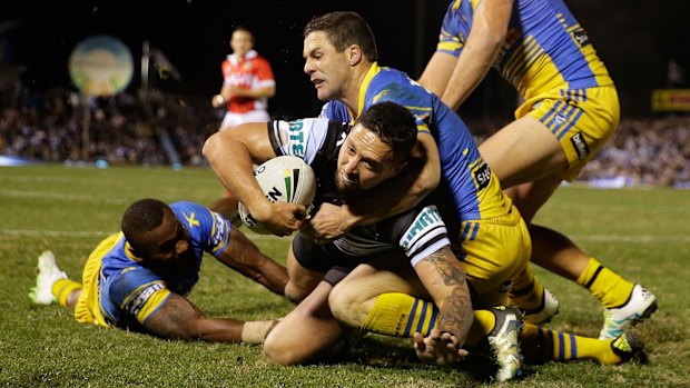 Brace: Gerard Beale reaches over to score one of his two tries.