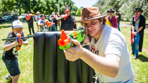 Canberra Nerf Games member Orrin Shilton with other participants at Weston Park.