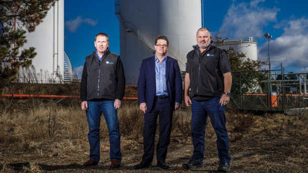 Director of Capital Recycling Solutions Adam Perry, Dean Ward from ActewAGL, and project manager Ewen McKenzie at the former Shell site marked for a waste-to-energy factory at Fyshwick.