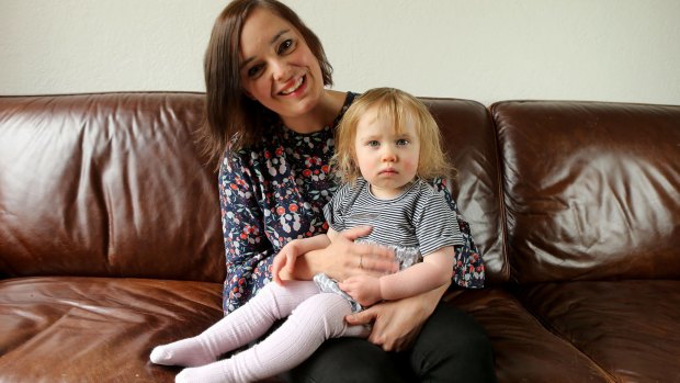 Embryologist Emily Shields with her 19-month-old daughter, Evie.