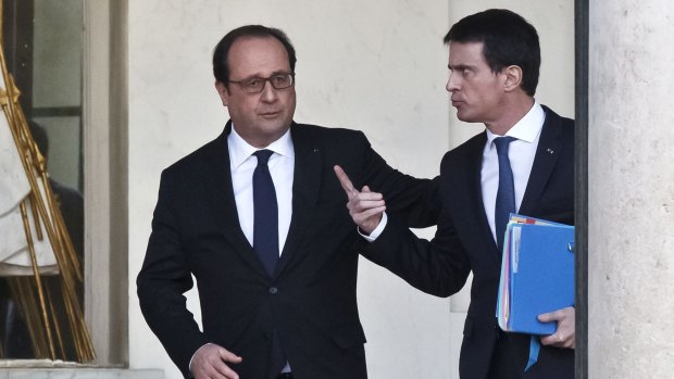 Francois Hollande, left, and French Prime Minister Manuel Valls after their weekly cabinet meeting at the Elysee Palace in Paris on Wednesday.