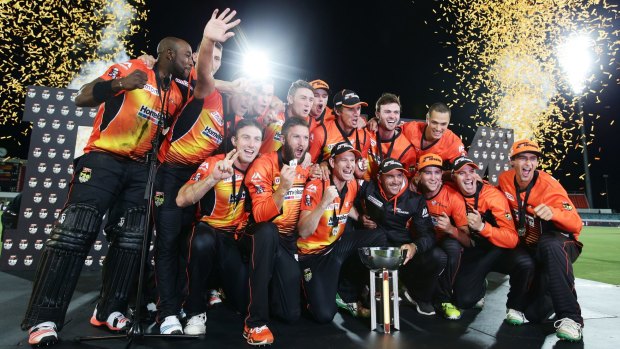 To the victors go the spoils: The Perth Scorchers celebrate their second straight Big Bash title in Canberra last season.