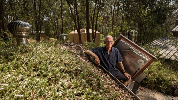 Dick Davies (OAM) with the fire bunker at his home in North Warrandyte.