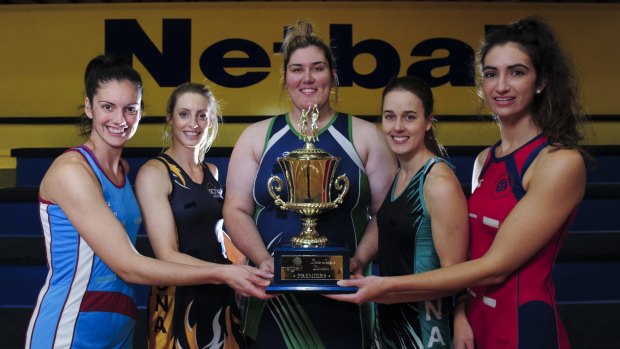 Tuggeranong captain Jo Pivac, centre, wants to keep her hands on the trophy. 