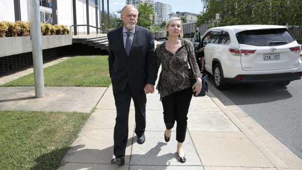 Vytas Kapociunas leaves the ACT Supreme Court on Saturday afternoon with his wife Jane Hardy, a former Australian ambassador to Spain.