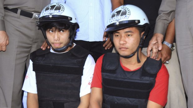 Zaw Lin, left, and Win Zaw Htun during an October 2014 police press conference after their arrest on Koh Tao, Thailand.