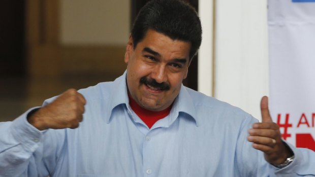 Venezuelan President Nicolas Maduro gestures as he speaks during a march in Caracas, on Thursday.