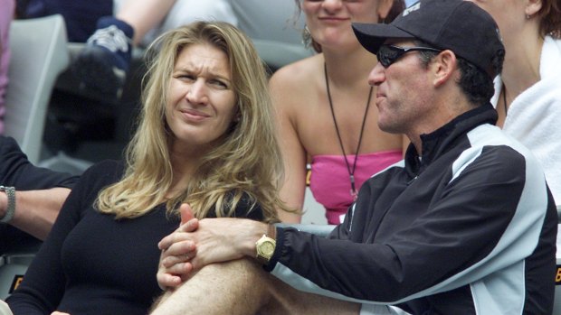 Been there: Four-time Australian Open champion Steffi Graf sits with Andre Agassi's coach Brad Gilbert as they watch the defending men's champion at the 2001 Australian Open.