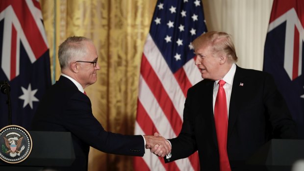 Prime Minister Malcolm Turnbull and United States of America President Donald Trump shake hands as they address the media during a joint press conference in the East Room at the White House during the Prime Minister's official visit to Washington DC.