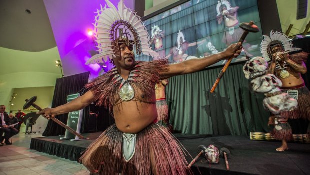 A Torres Strait dance group performed in full mask and tribal costumes to launch a new exhibition at the National Museum of Australia, Evolution: Torres Strait Masks.