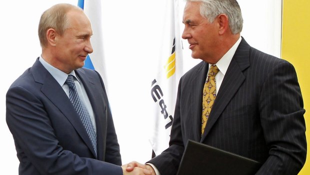 Russian President Vladimir Putin, left, and ExxonMobil chief executive Rex Tillerson, picked for US secretary of state.