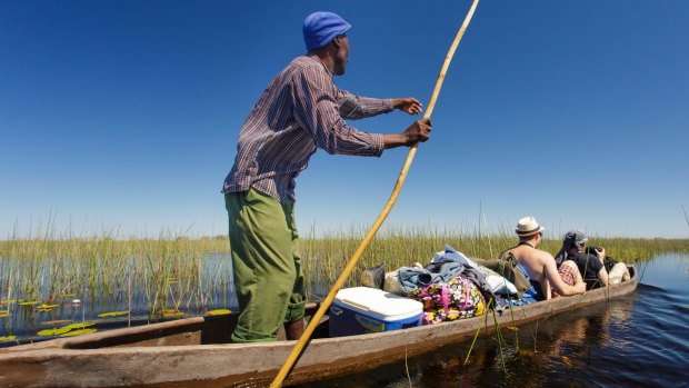 Travelling in traditional Okavango style.