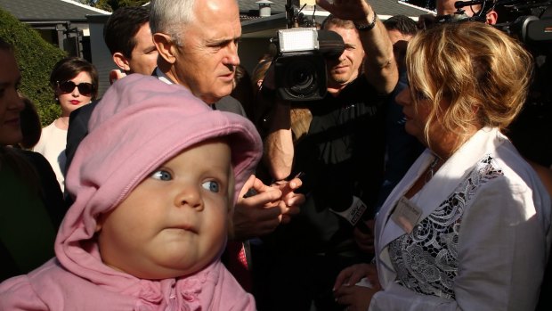 Prime Minister Malcolm Turnbull, on the campaign trail in Penrith with one-year-old Freya Brown, said last week "the budget is very fair".