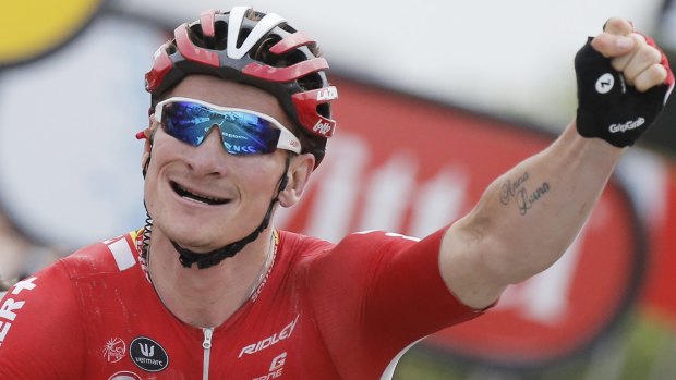 Sprint king Andre Greipel celebrates as he crosses the line to claim a stage 15 victory in Valence. 