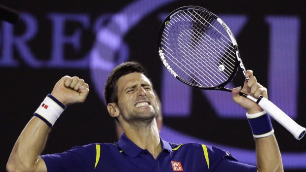 Novak Djokovic of Serbia celebrates after defeating Roger Federer of Switzerland in their semi-final at the Australian Open tennis championships in Melbourne.