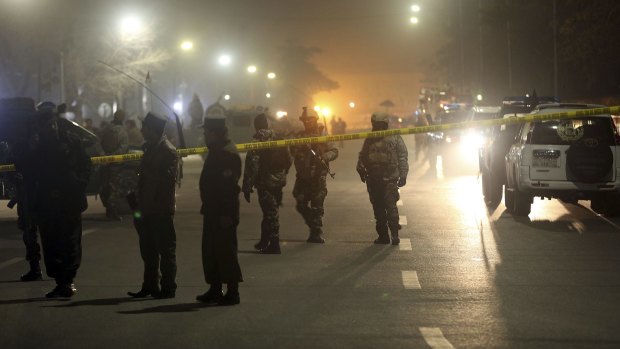Scene of blast: Afghanistan security forces outside the French cultural centre in Kabul.