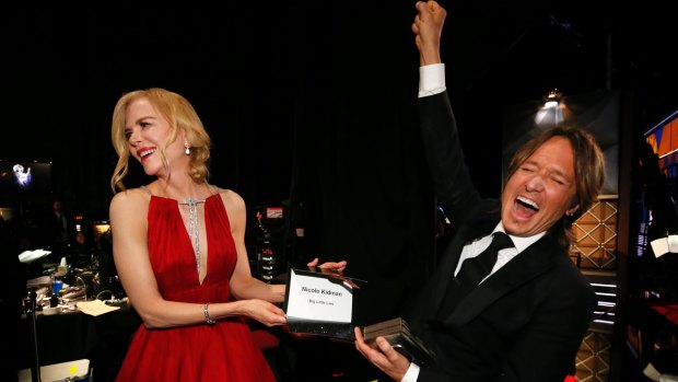 Nicole Kidman, winner of the award for outstanding lead actress in a limited series or a movie for Big Little Lies, and Keith Urban backstage.