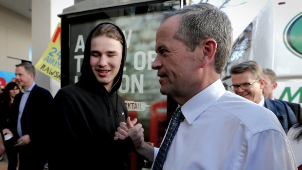 Opposition Leader Bill Shorten greets shoppers during a street walk at Westfield Penrith in western Sydney on Friday.