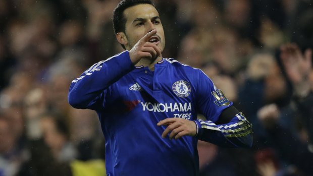 Happy days: Pedro celebrates scoring his side's second goal.