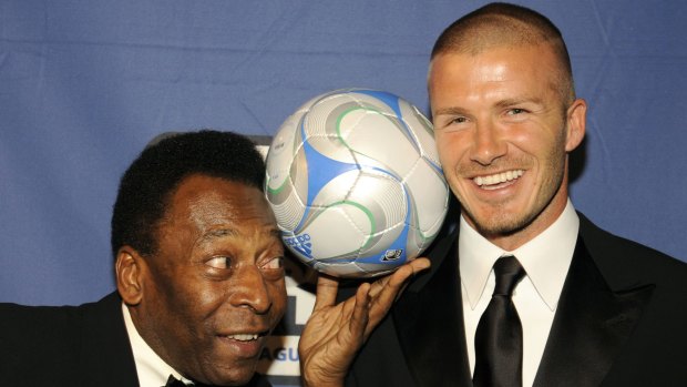 Superstars: Pele with David Beckham at a football function in New York City in 2008. 