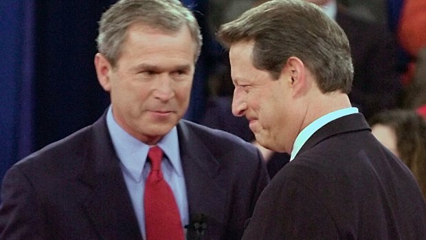 Republican presidential candidate Texas Governor George W. Bush, left, greets Democratic presidential candidate Vice President Al Gore before their debate in 2000.