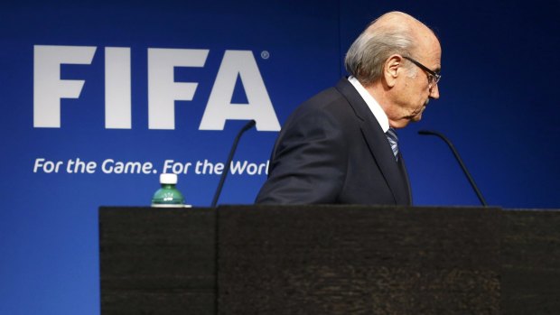 When Sepp left: FIFA President Blatter walks after announcing he was standing down.