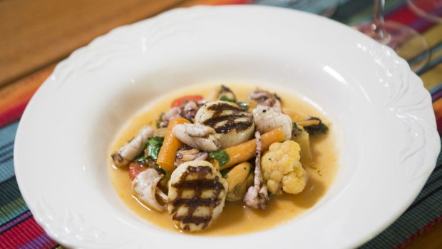 Go-to dish: Scallops, grilled calamari, and mussels with vegetables a la grecque. 