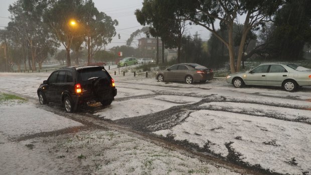 Cars are pelted with hail in Kingsford.