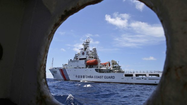 A Chinese Coast Guard ship attempts to block a Philippines government vessel as the latter tries to enter Second Thomas Shoal in the South China Sea in March.