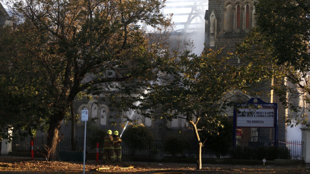 Firefighters battle the blaze at  St James Church in Brighton.