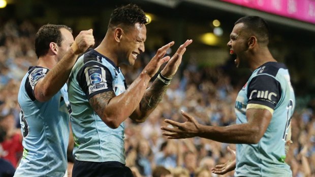 Winners are grinners: Israel Folau and Kurtley Beale celebrate victory in  the round 11 Super Rugby match between the Waratahs and the Cheetahs at Allianz Stadium.