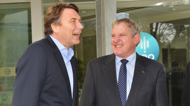CSIRO chairman David Thodey with Federal Industry Minister Ian MacFarlane. CSIRO funding cuts have impacted on its annual climate change survey.