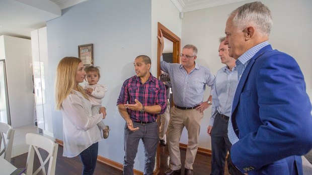 Prime Minister Malcolm Turnbull, Treasurer Scott Morrison and local member David Coleman visited Kim and Julian Mignacca and daughter Addison on Sunday to talk about negative gearing.