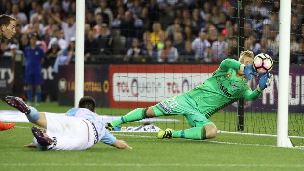 Victory goalkeeper Lawrence Thomas is beaten by a shot from Bruno Fornaroli.