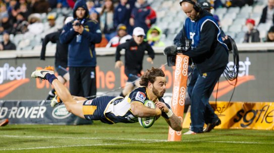 Brumbies' Andy Muirhead scores a try to secure a 24-12 victory over the Hurricanes and snap a two-year Kiwi drought. g