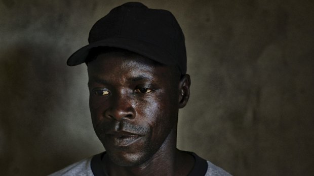 Alexander Kaine, who helped burn bodies during the Ebola outbreak, in Marshall, Liberia, last month. 