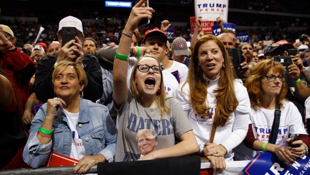 Supporters cheer for Republican presidential candidate Donald Trump.
