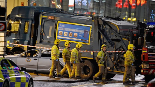 Emergency services attend the scene of the crash in Glasgow.