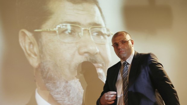 Yehia Hamed, former Investment Minister of ousted Egyptian Islamist President Mohammed Morsi, arrives for a press conference in Istanbul, Turkey on Tuesday.