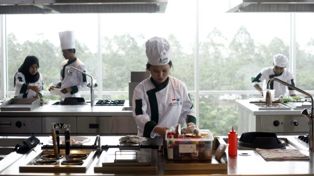 Careers Australia runs commercial cookery classes in Indonesia in partnership with Indonesian fast food chain Es Teler 77.
