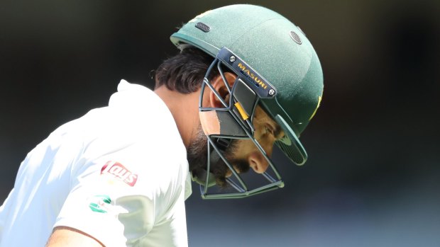 Misbah-ul-Haq of Pakistan leaves the field after being dismissed second ball during day five of the second Test at the MCG.