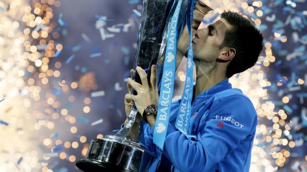 Too good: Novak Djokovic maintained his hold over Roger Federer with victory in the ATP World Tour Finals final.