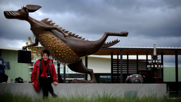 Artist Anne Ross with Gungahlin's sculpture<i>  A is for Alexander, B is for Bunyip and C is for Canberra</i>, which required $5370  of maintenance less than three years after it was unveiled.