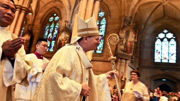 Sydney Archbishop Anthony Fisher leads the Christmas Day service at St Mary's Cathedral.