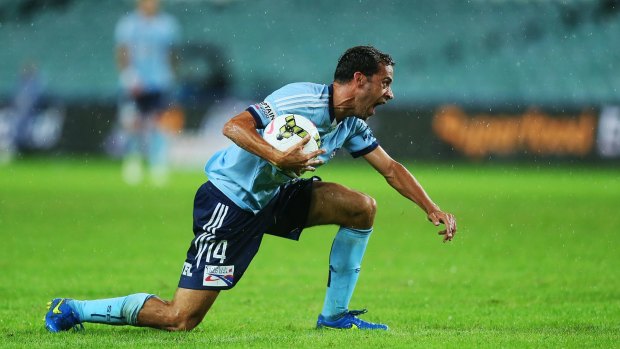 Disputed call: Alex Brosque is furious after being fouled against Adelaide.