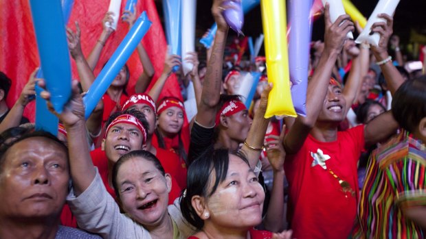 Jubilation among NLD supporters in Yangon on Monday. 