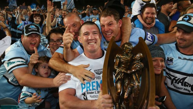 Sweet victory: Paul Gallen is mobbed by Sharks fans after the game.
