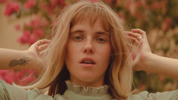 Hallie's latest single is a snub at society's quickness to judge others and the necessity of kindness. 