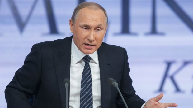 Russian President Vladimir Putin speaks during his annual news conference in Moscow on Thursday - it lasted for more than three hours. 