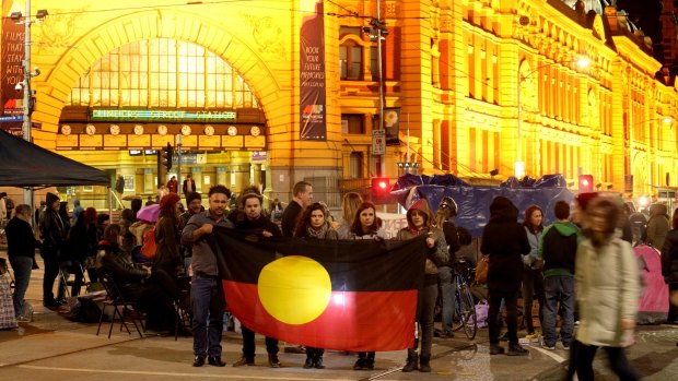 The protest outside Flinders Street station on Saturday night over the treatment of Indigenous youth in detention. 
